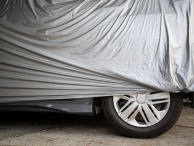 Car covered with waterproof cloth